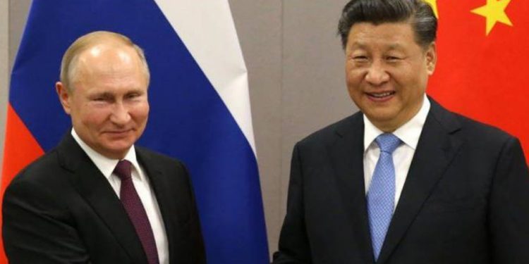 Putin, Xi meet for high-stakes talks in challenge to West