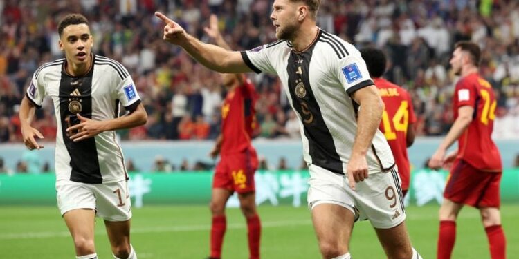 Fuellkrug strikes late to salvage Germany World Cup draw with Spain