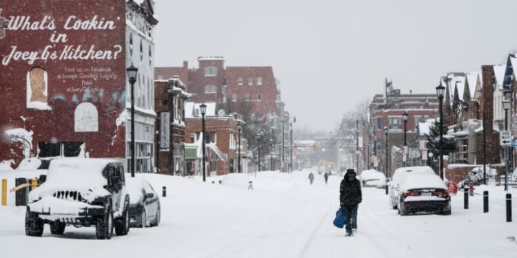 US digs out from monster storm as death toll passes 50