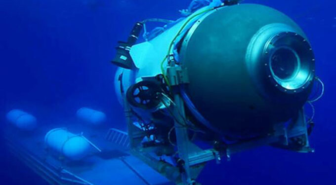 Rescuers embark on all-night race to save Titanic sub crew