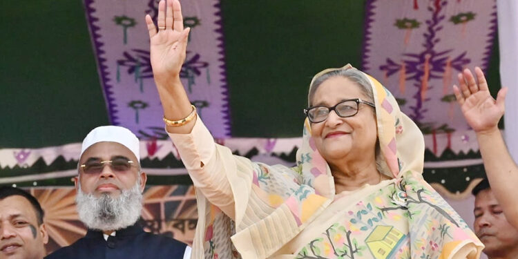 Upcoming  general election will be held at any cost: PM Hasina tells huge rally in Kawla