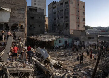 Israeli strikes kill multiple civilians at shelters in Gaza combat zone, as Blinken seeks more aid