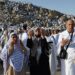 Muslim pilgrims pray on Mount Arafat in hajj climax
