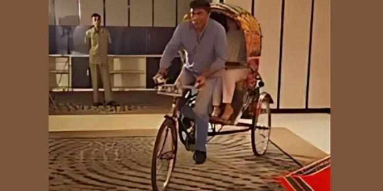 Pakistan’s high commissioner drives a rickshaw with his wife in Dhaka