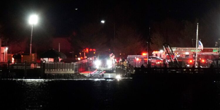 Plane carrying more than 60 collides with helicopter, crashes in Washington